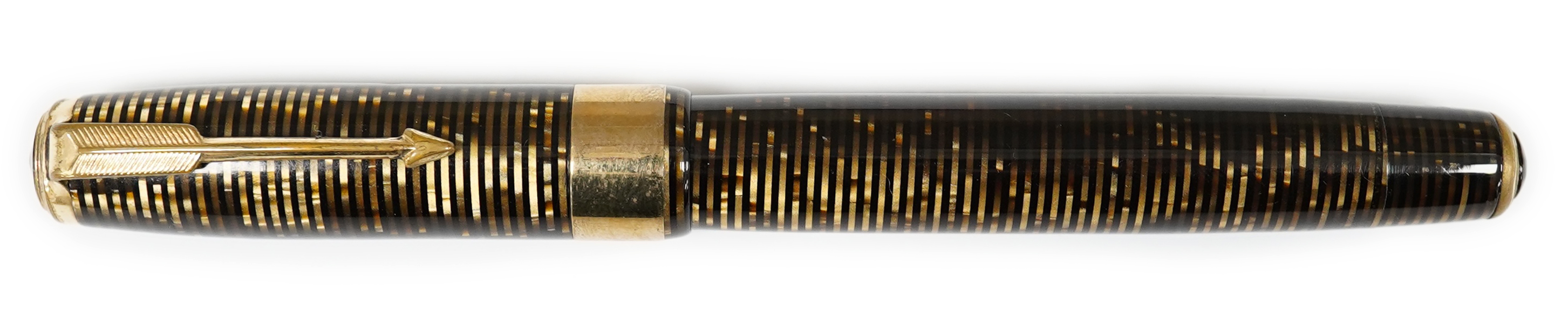 A Parker Vacumatic in brown with rare wide cap band